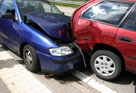 Blue and red vehicle in an accident